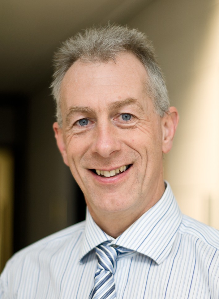 A person smiling for the picture

Description automatically generated with low confidence